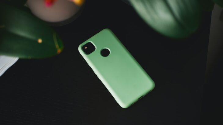 iphone with green phone case