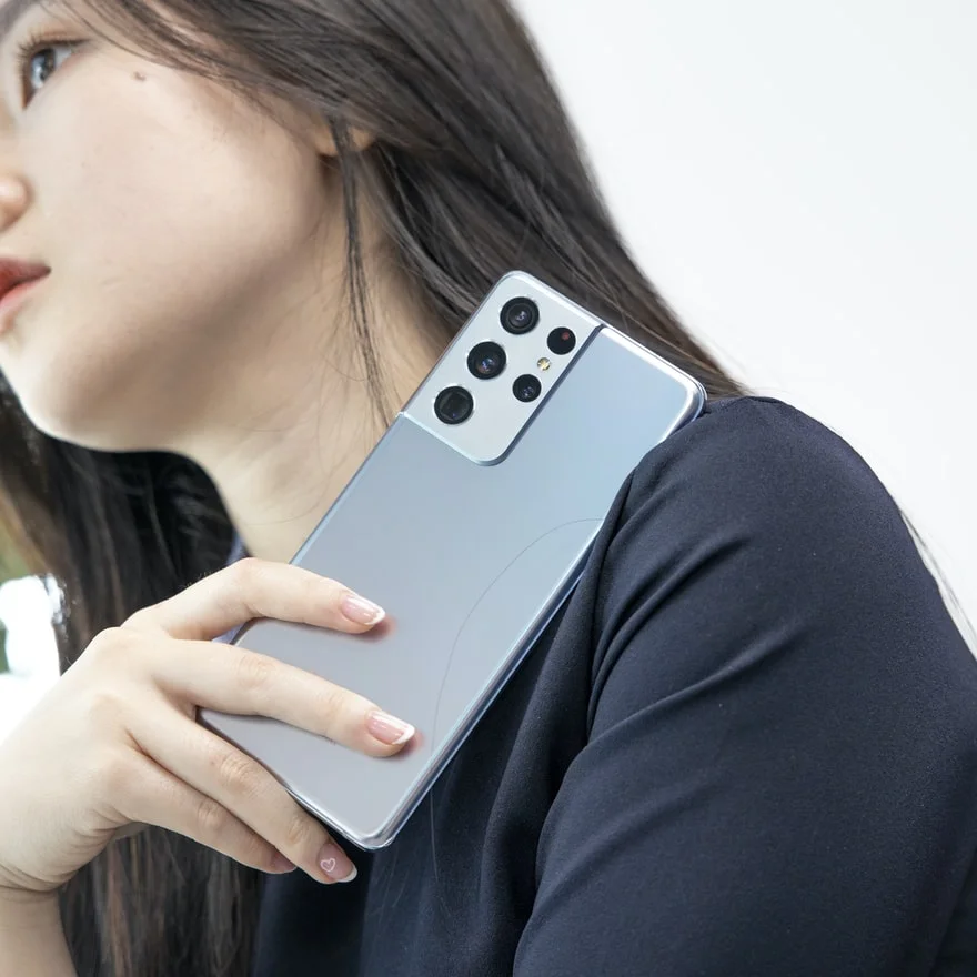 woman holding phone